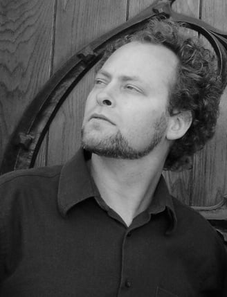 Black-and-white portrait of Aharon Wheels Bolsta in profile