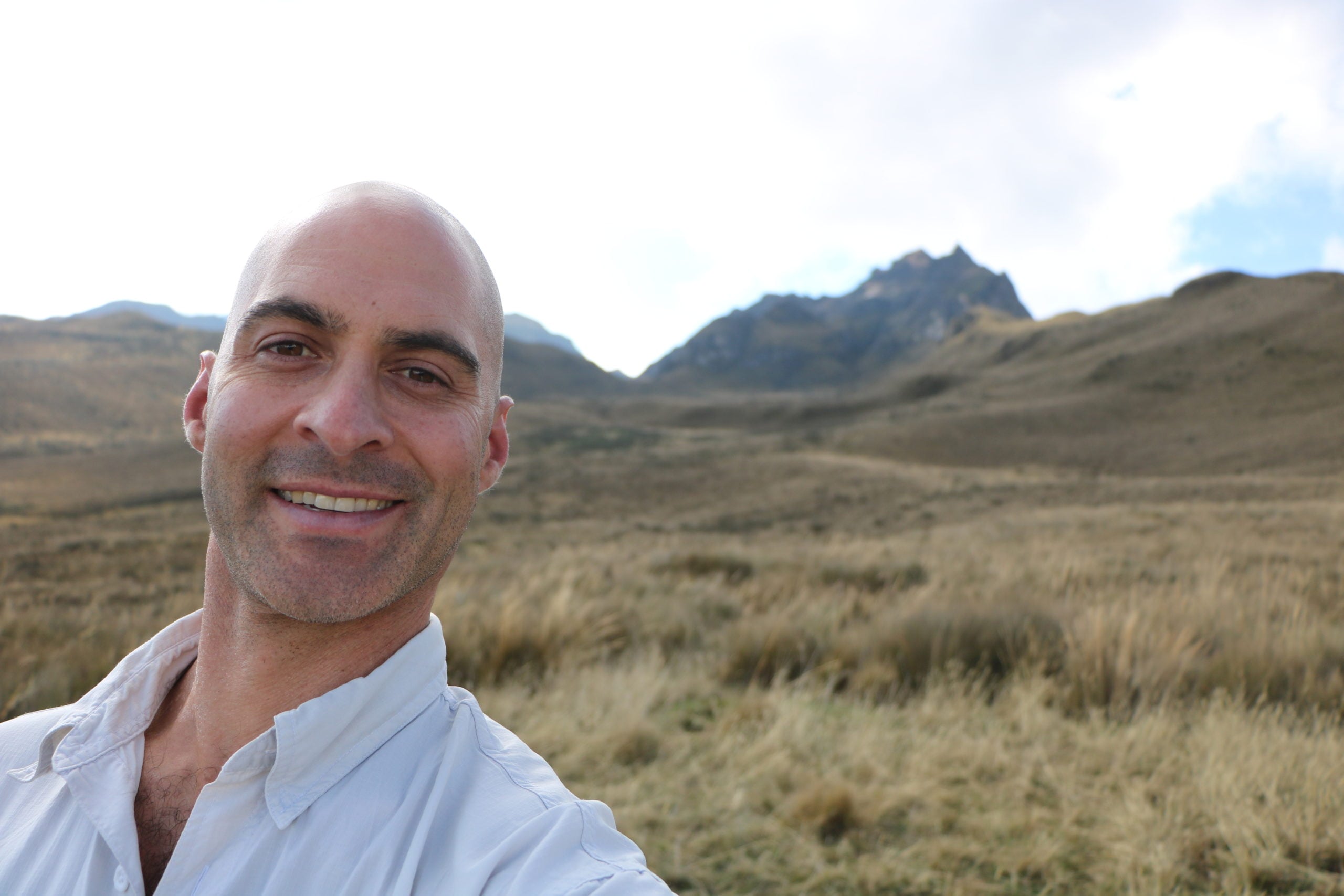 Kerry Kriger on the high-altitude páramo grassland below the rocky summit of Pichincha volcano, Ecuador
